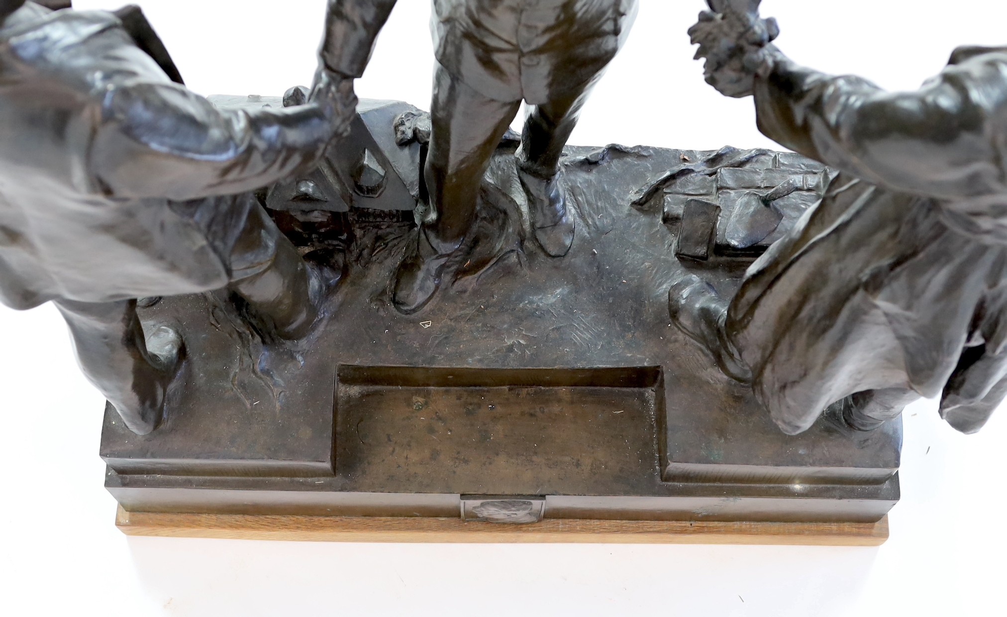 Ladislav Jan Šaloun (Czech, 1870-1946) a large bronze group of a dignitary greeting two men, early 20th century, 72cm high, 64.5cm wide